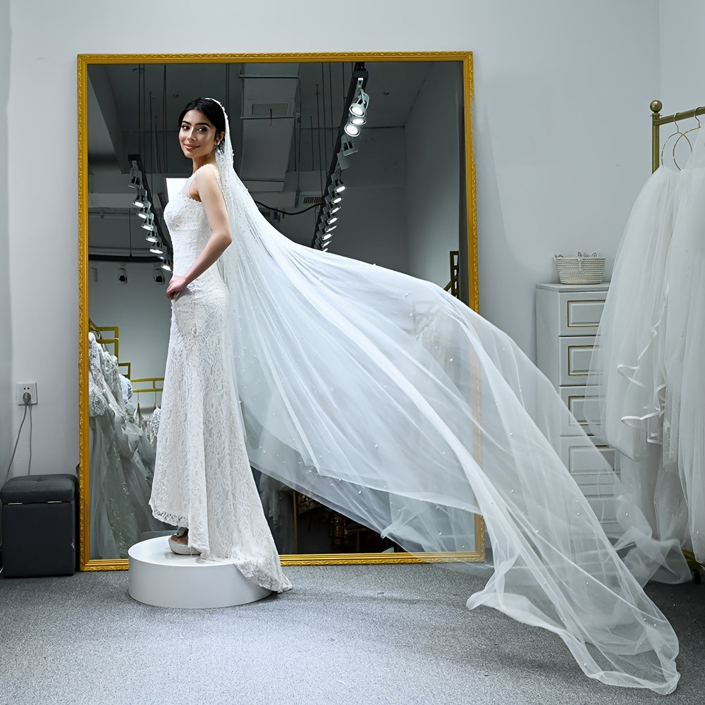 Qoʻlda yuvish parvarishi bilan toʻy voil uchun marjon bilan bezatilgan