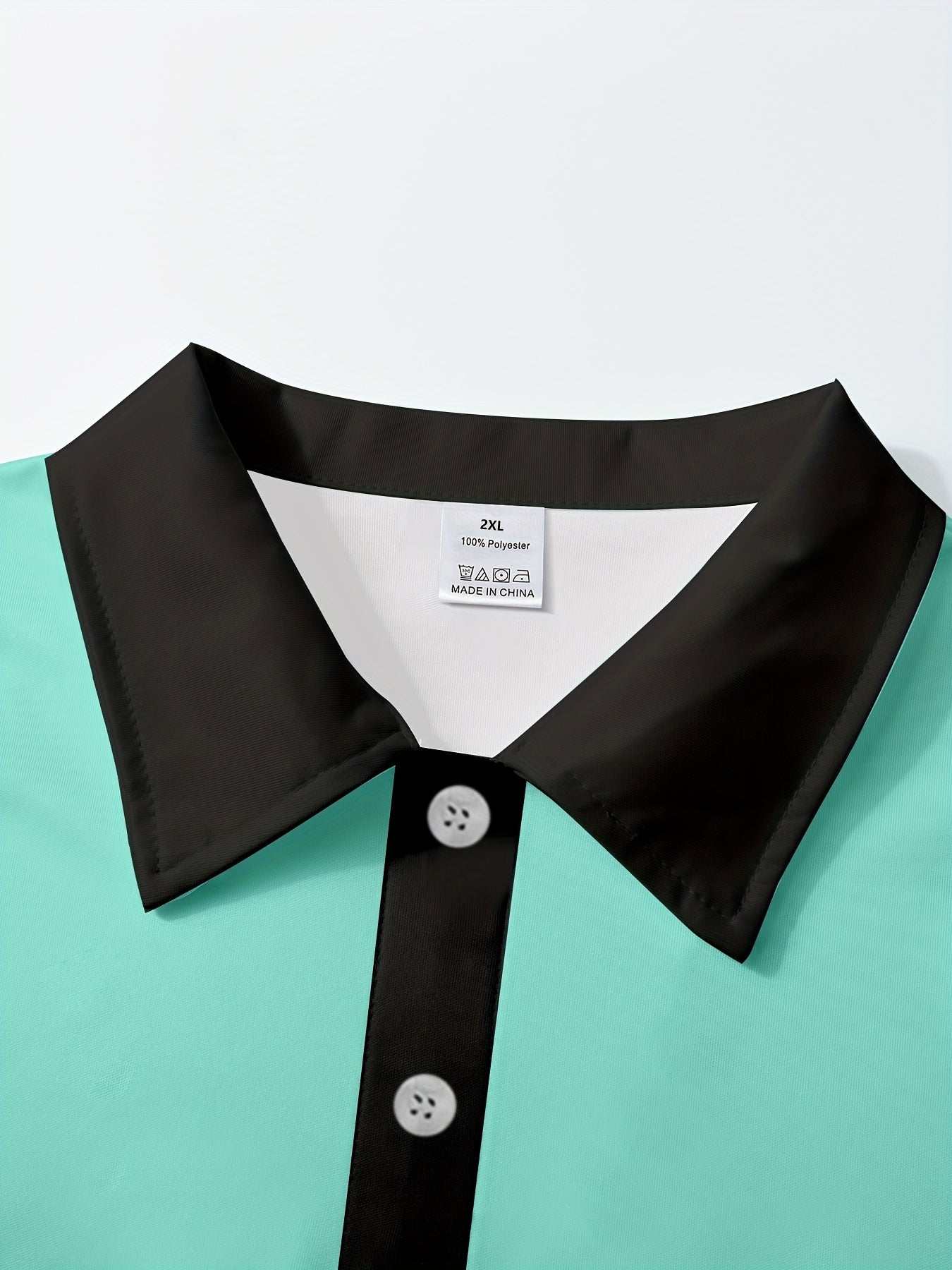 Yozgi erkaklar moda ko'ylagi jade yashil rangda, qarama-qarshi trim bilan, nafas oladigan polyesterdan tayyorlangan va mashinada yuvilishi mumkin. Katta o'lchamda mavjud.