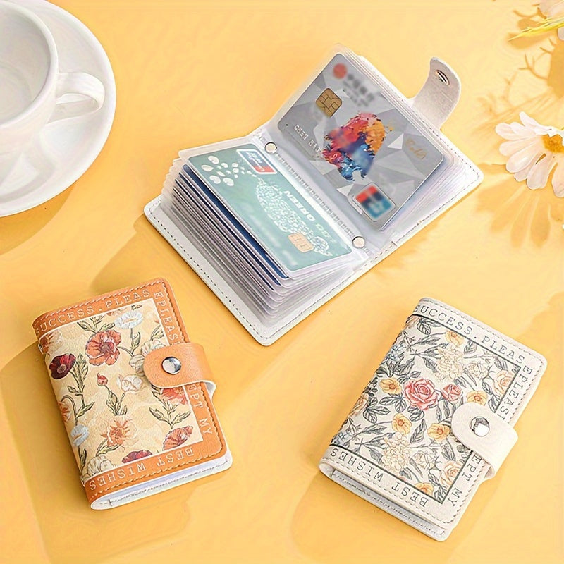 Sintetik charmli ayollar uchun hamyon, bir nechta karta joylari, tugmachali yopilish va yorqin atirgul dizayni bilan.