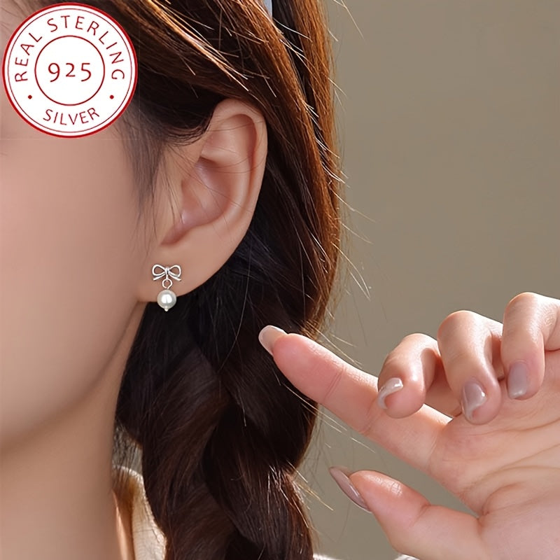 Pendientes de perlas falsas con lazo de plata de ley para mujer