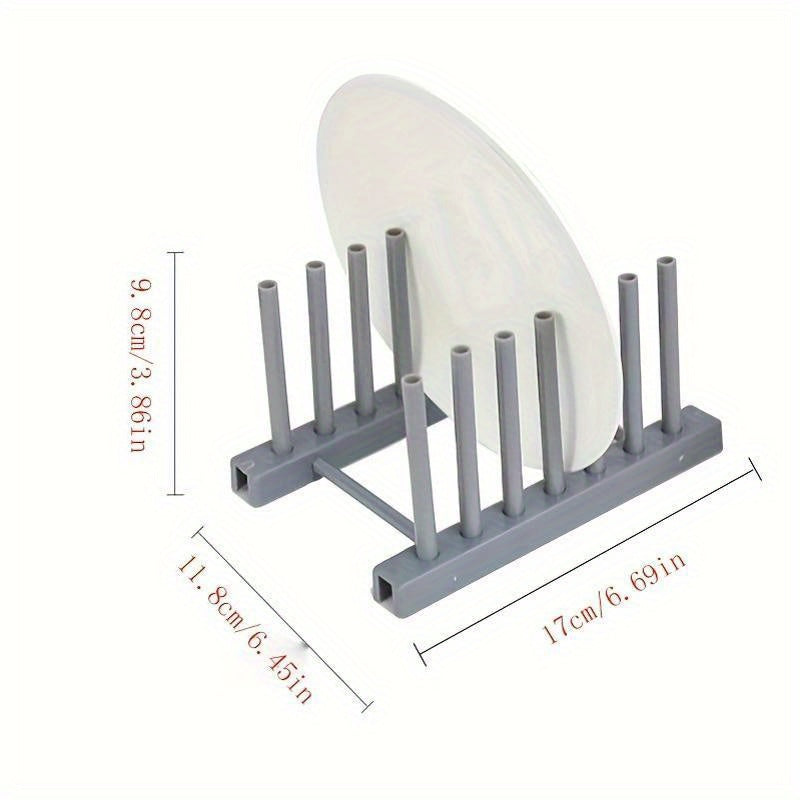 Oson oshxona ish stolida saqlash va idishlarni quritish uchun olib tashlanadigan plastinka ushlagichi va drenaj trayi bilan plastik idish qurituvchi.