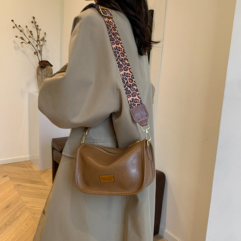 Women's Shoulder Bag with Adjustable Leopard Print Strap Zipper Closure Edge Paint Detail