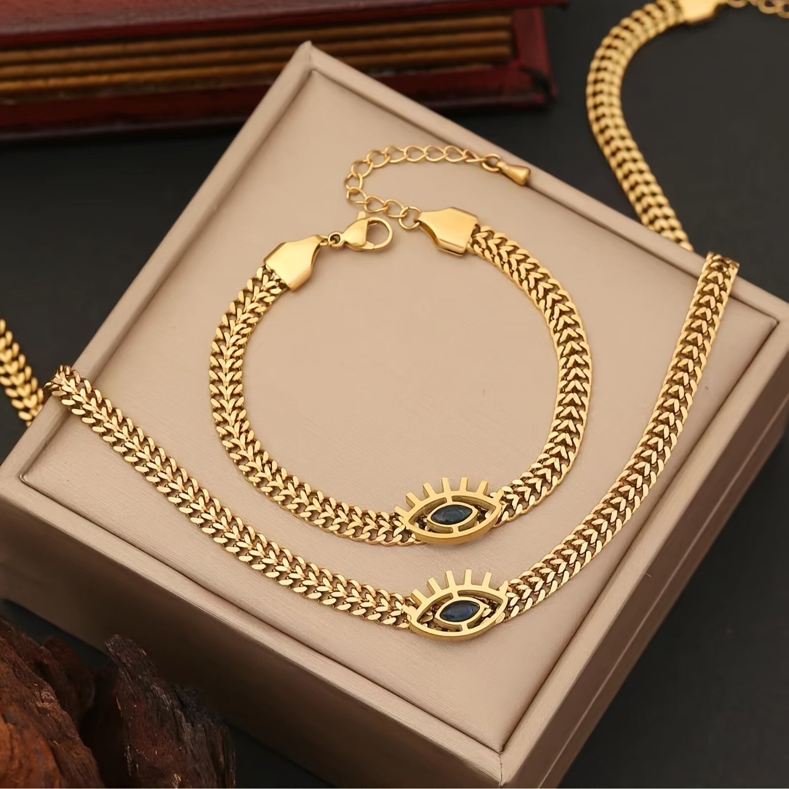 Golden Stainless Steel Hollow Eye Necklace and Bracelet Set for Women