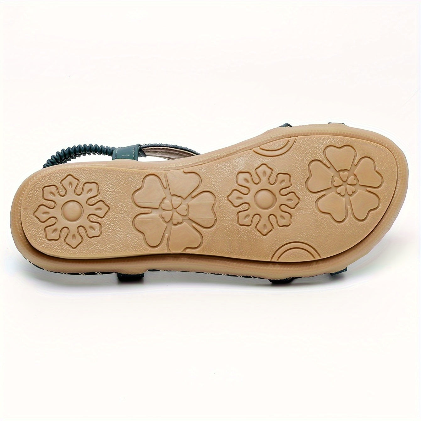 Qabila uslubidagi chiziqli naqsh va rhinestone aksentlari bilan bezatilgan tekis poyabzal, yozgi plyaj kiyimlari uchun mukammal. Ochiq barmoq slip-onlar, TPR taglik bilan, bohem vintage ko'rinish uchun ideal. Huizhouda ishlab chiqarilgan.