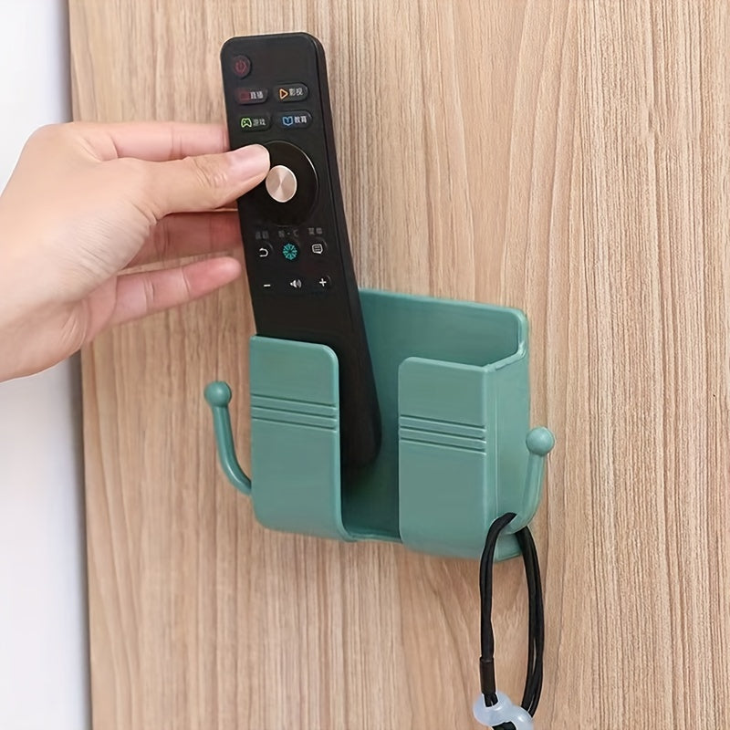 Soporte de pared rosa para teléfono y mando a distancia con almacenamiento de múltiples compartimentos