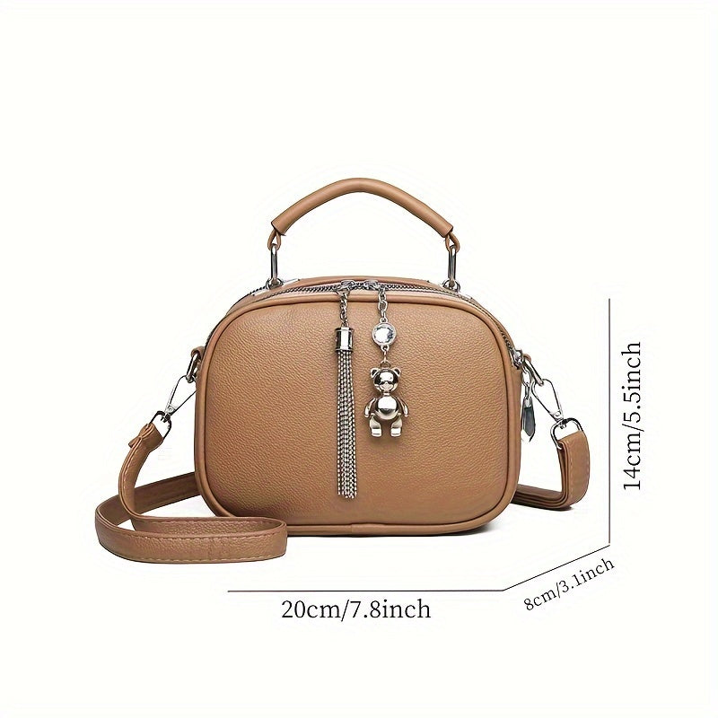 Black Mini Crossbody Bag with Bear Tassel and Multiple Compartments