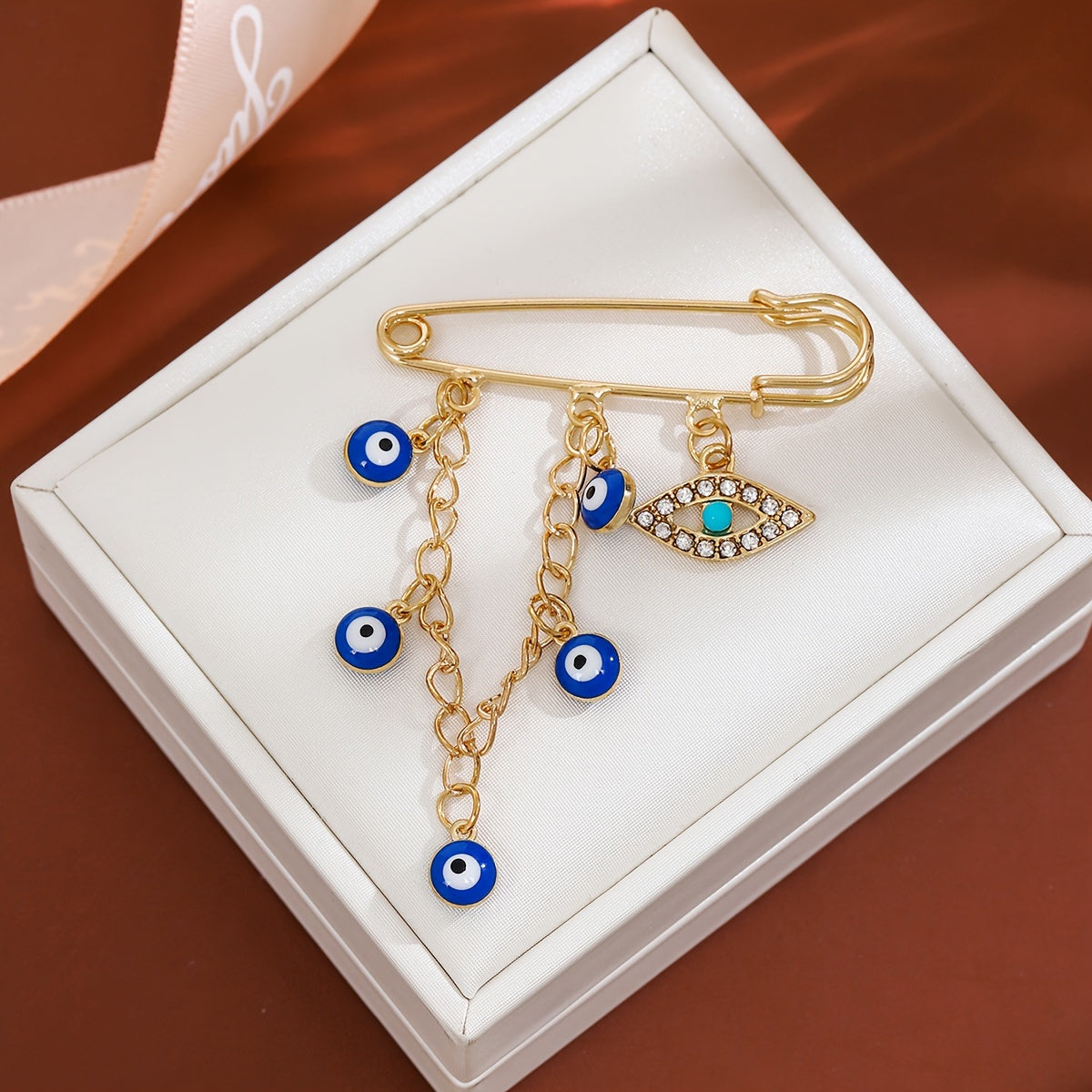 Set of 2 Vintage Crystal Evil Eye Brooches in Blue with Tassels and Cold Wind Detailing