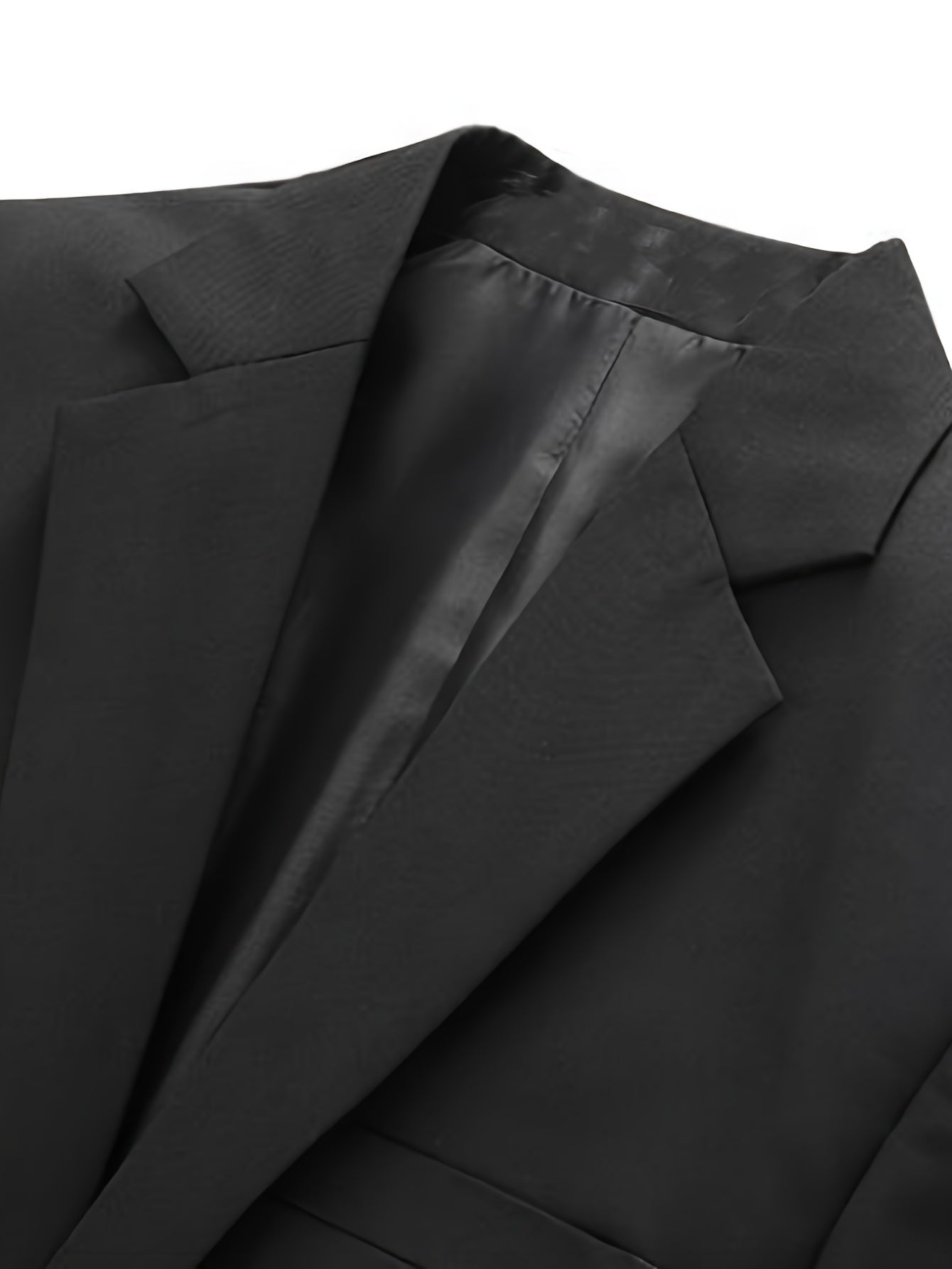 Erkaklar uchun tasodifiy bir rangli blazer, polyester matodan, yengli ko'ylak, bitta tugma bilan, va yirtilgan pastki qismi.