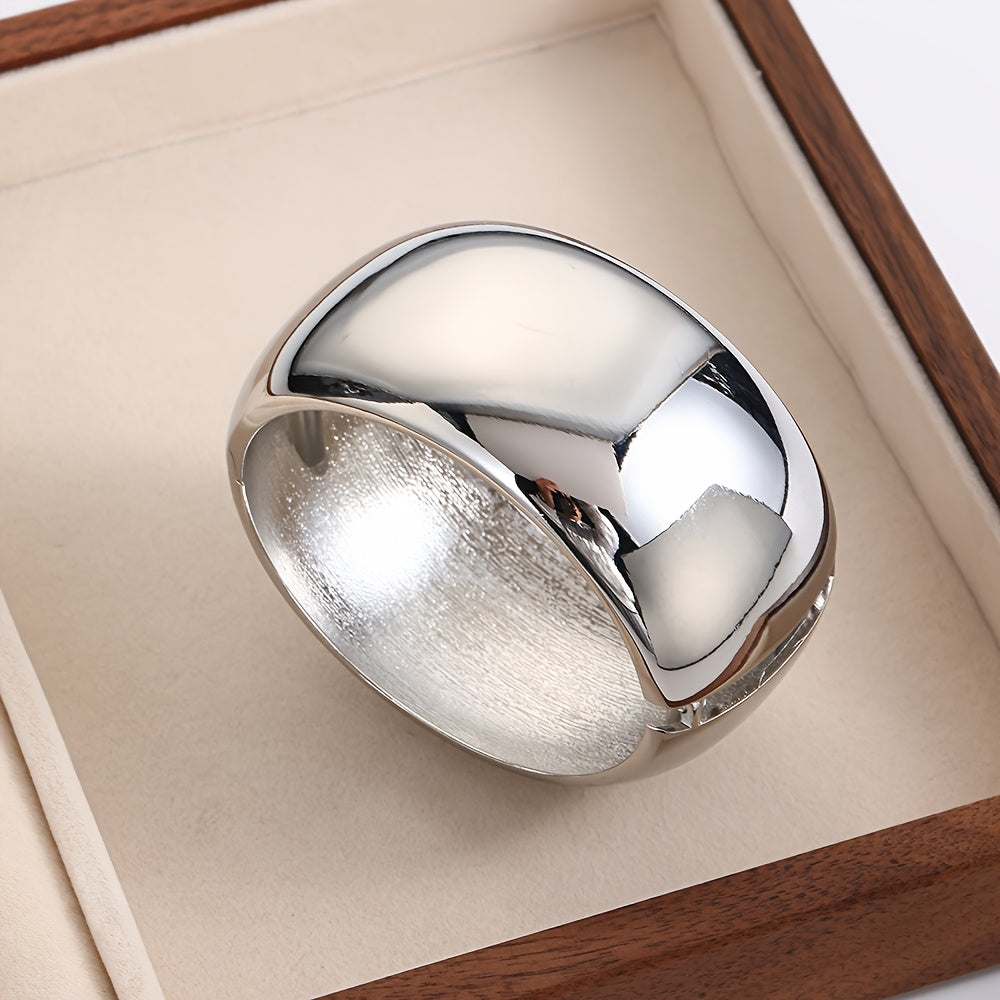 Zarif va silliq zanglamas po'latdan yasalgan baraban bilaguzuk, keng va qalin bangle dizayniga ega. Ushbu ko'p funksiyali moda aksessuari kundalik kiyish yoki sovg'a berish uchun juda mos keladi.