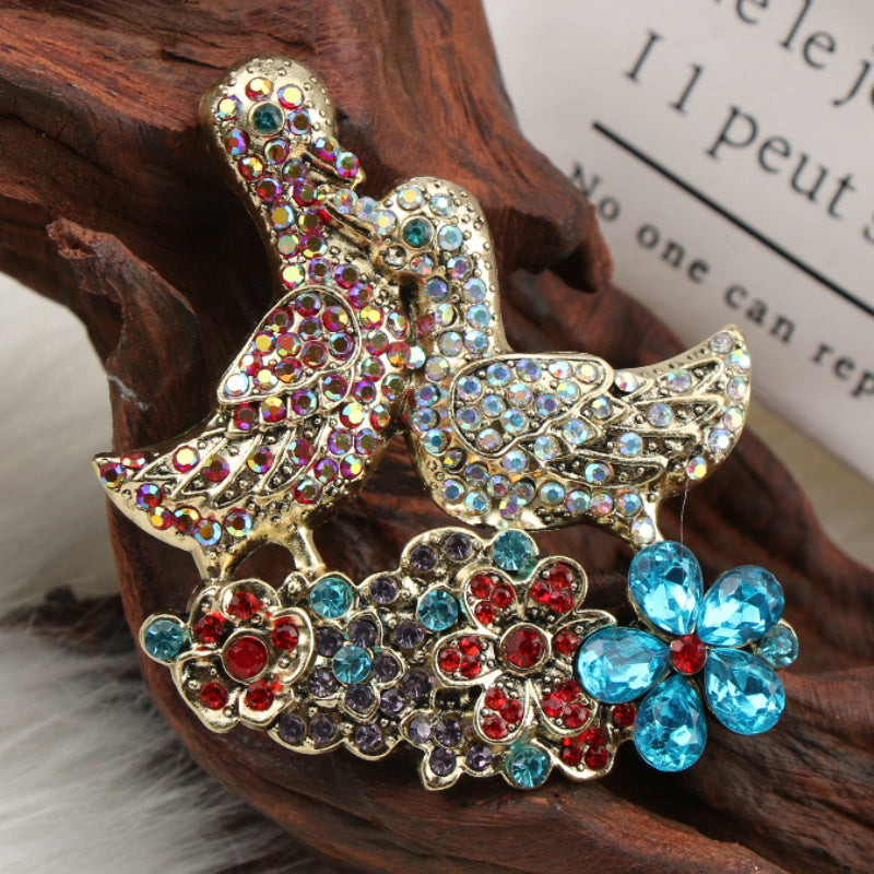 Elegant Mandarin Duck Brooch Pin with Rhinestones and Floral Accents Jewelry