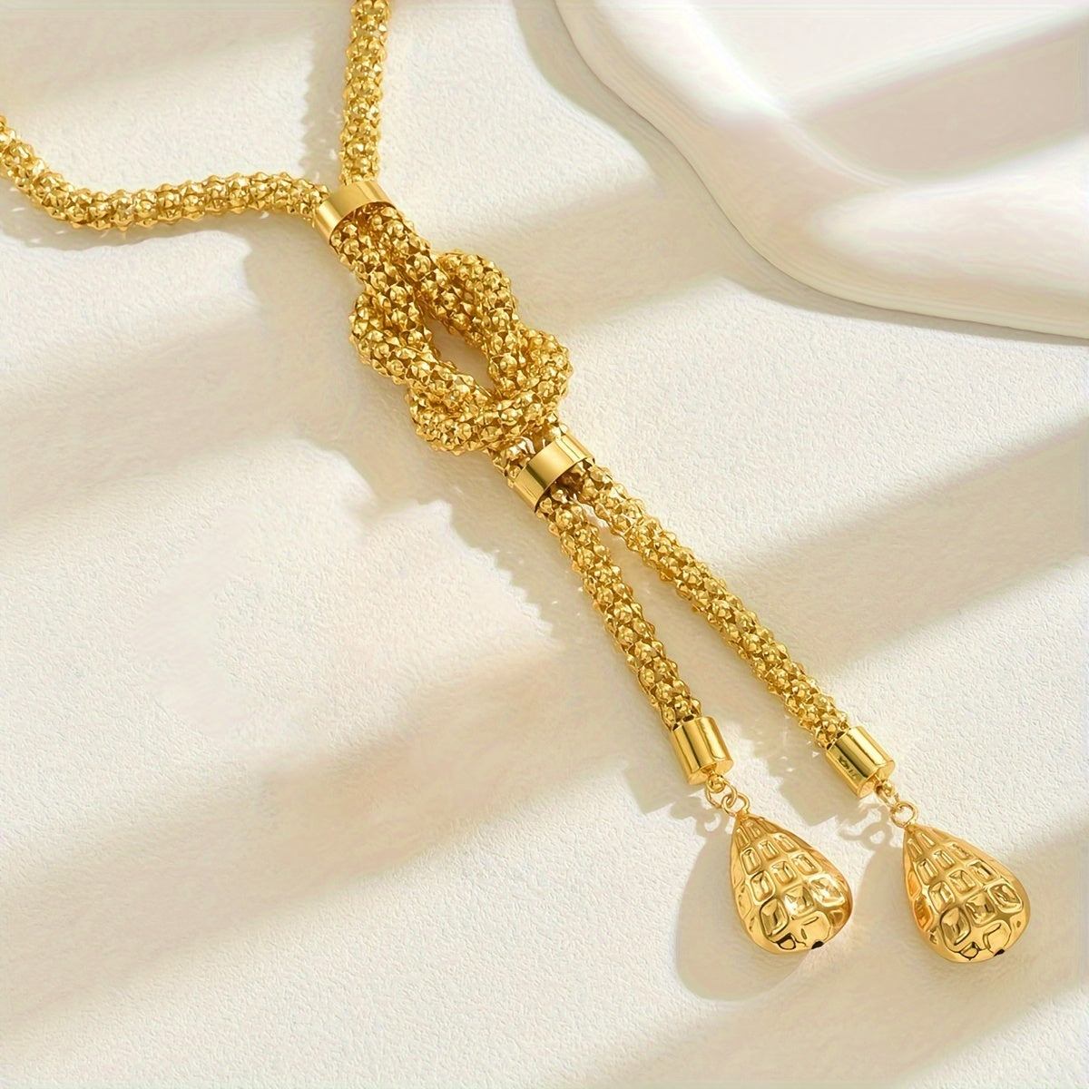 Women’s Long Geometric Twist Necklace with Tassel Drop Pendant for Weddings and Parties