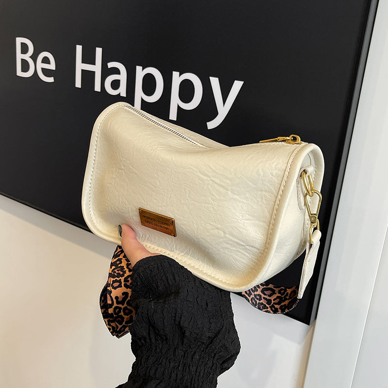 Women's Shoulder Bag with Adjustable Leopard Print Strap Zipper Closure Edge Paint Detail