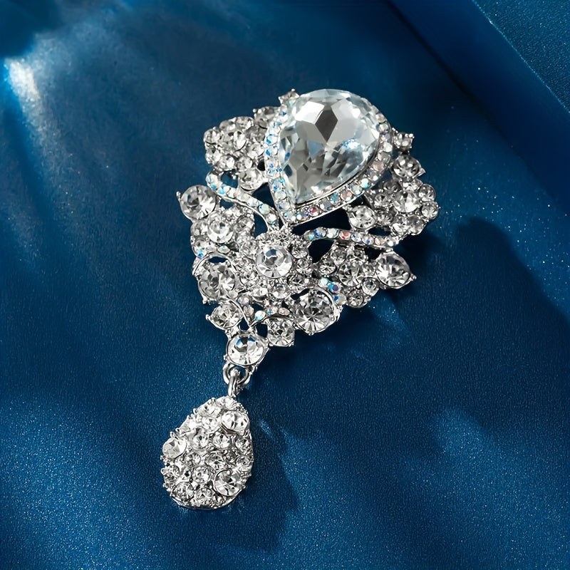 Zargarlik toshlari bilan bezatilgan nozik brosh - har qanday kiyimga zamonaviy va nafis qo'shimcha