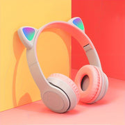Auriculares inalámbricos para juegos con luces LED, diseño plegable, ranura para tarjeta SD, carga tipo C, compatible con tablets, ordenadores, televisores y teléfonos