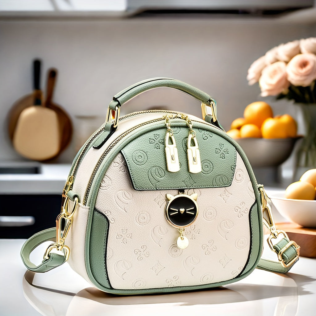 Bolso cruzado redondo negro para mujer con correa ajustable y cierre de cremallera