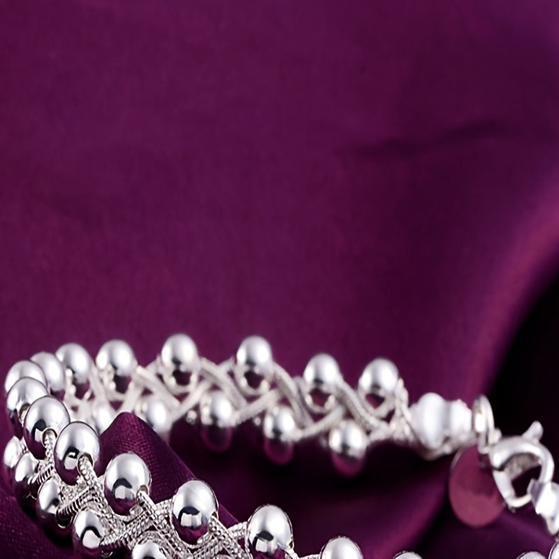 Стильный и художественный ручной браслет с серебром 925 пробы и детализированными бусинами