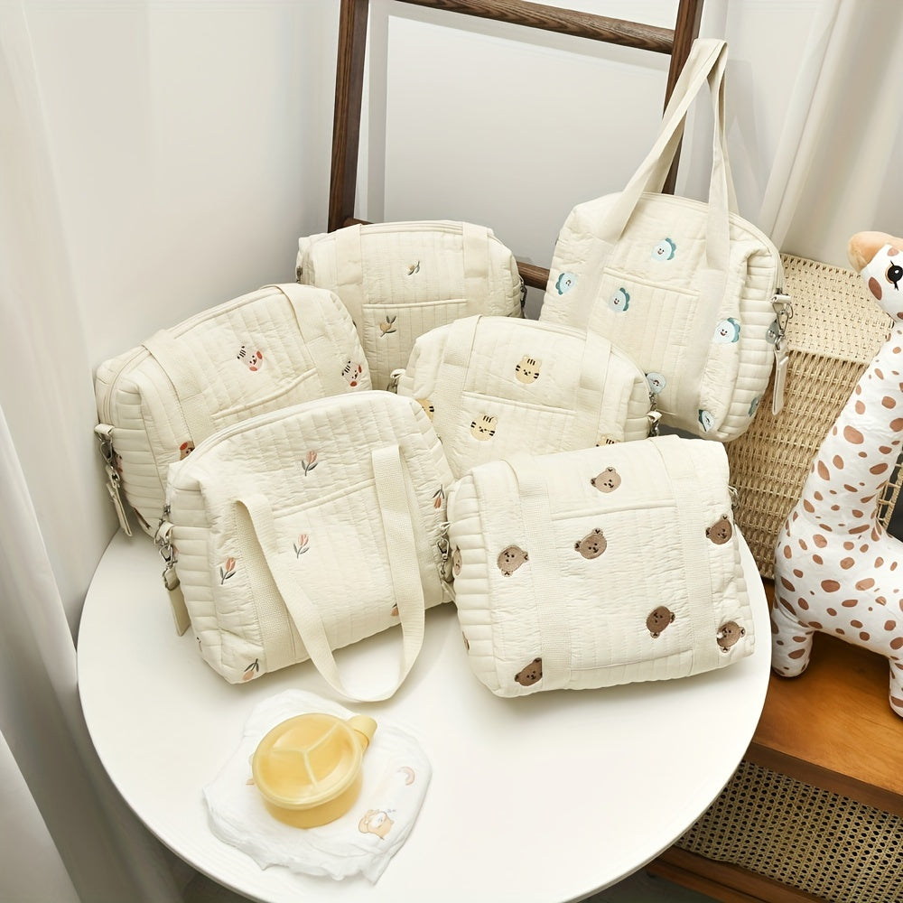 Spacious Embroidered Diaper Bag with Milk Bottle Organizer Multi-Functional Baby Stroller Hanging Bag