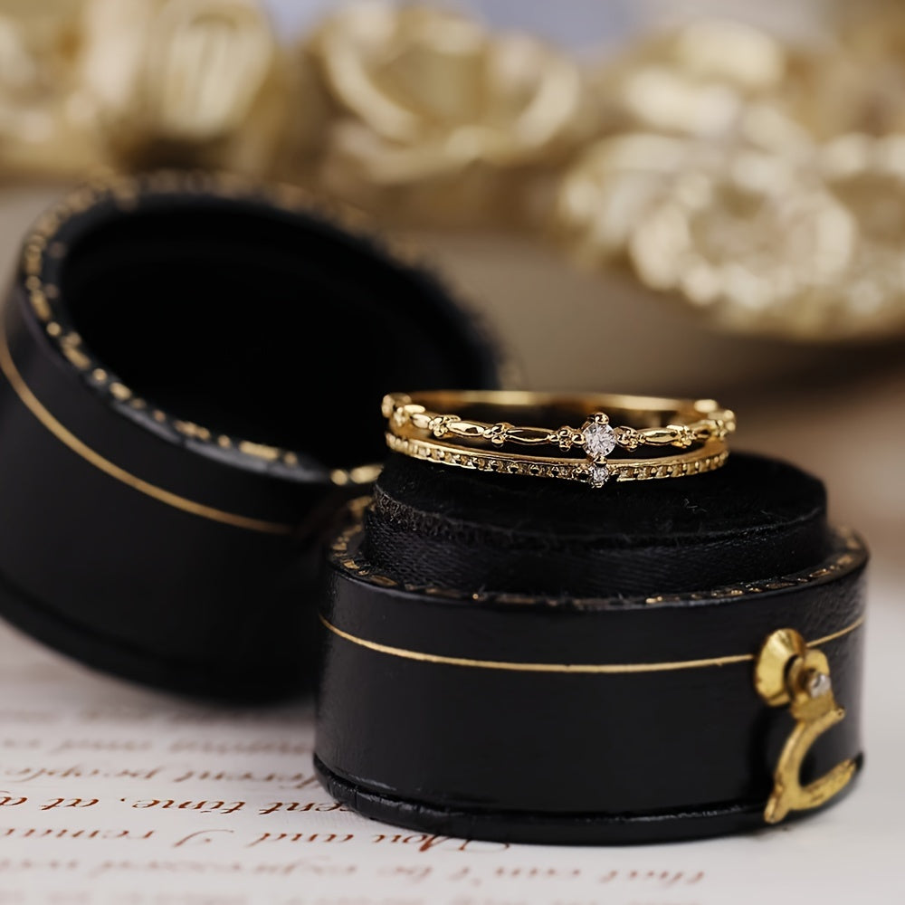 Zarif va chiroyli S925 kumush zirkoni ikki qatlamli toj uzuk, hashamat va retro jozibasi bilan to'la, bu esa uni ayollar uchun 14-fevral yoki har qanday maxsus tadbirda mukammal sovg'a qiladi.