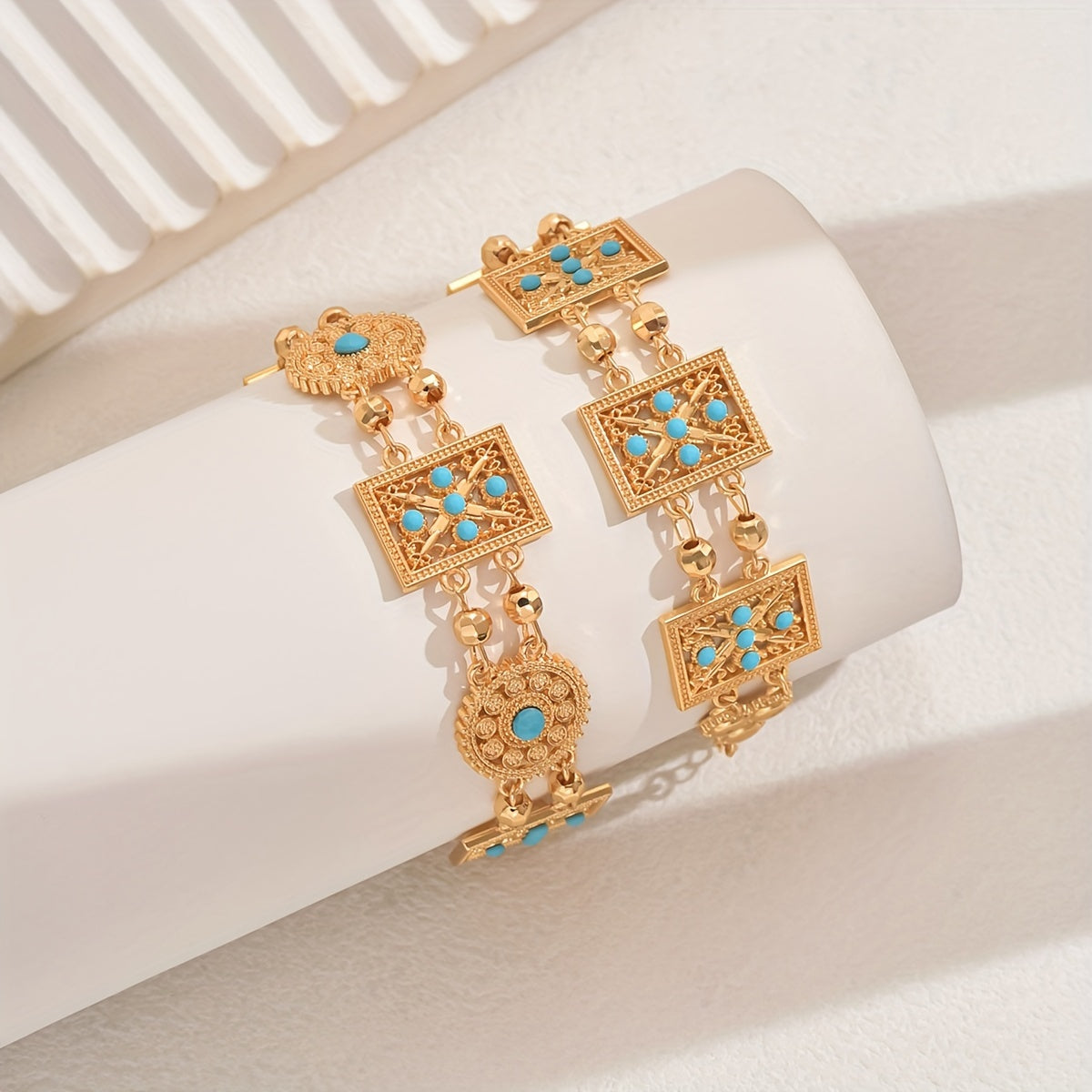 Women’s Gold Plated Alloy Bracelet with Geometric Cut-Out and Blue Cubic Zirconia