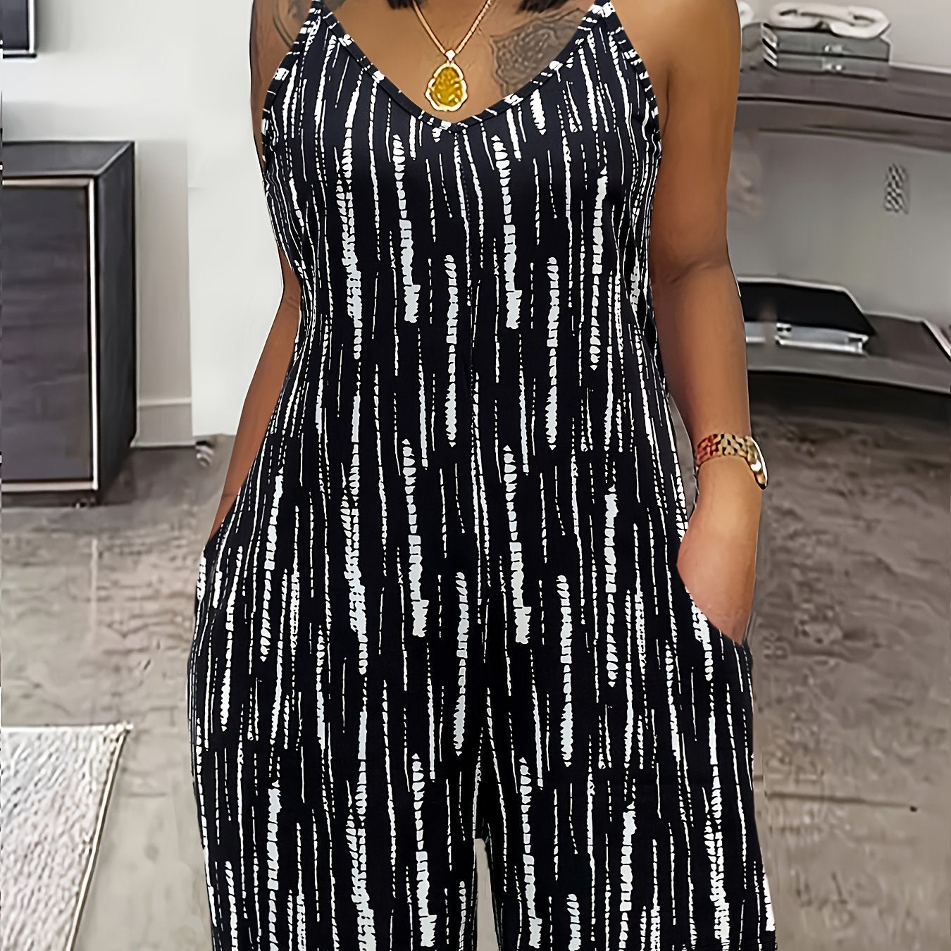 Women's Black and White Striped Sleeveless Jumpsuit with Pockets