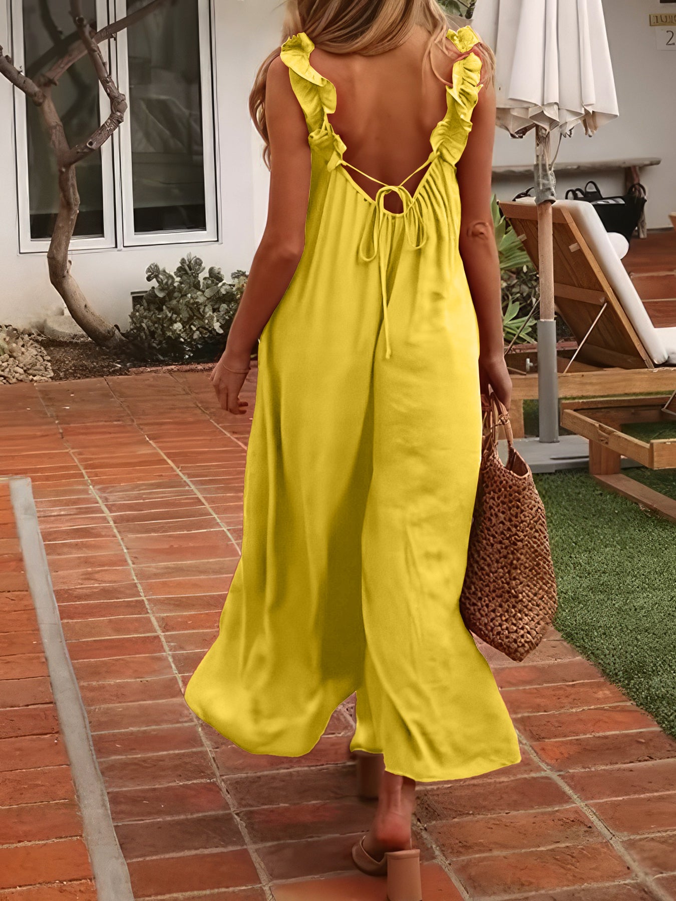 Plus Size Women's Black Sleeveless Jumpsuit with Ruffle Detail and Wide-Leg