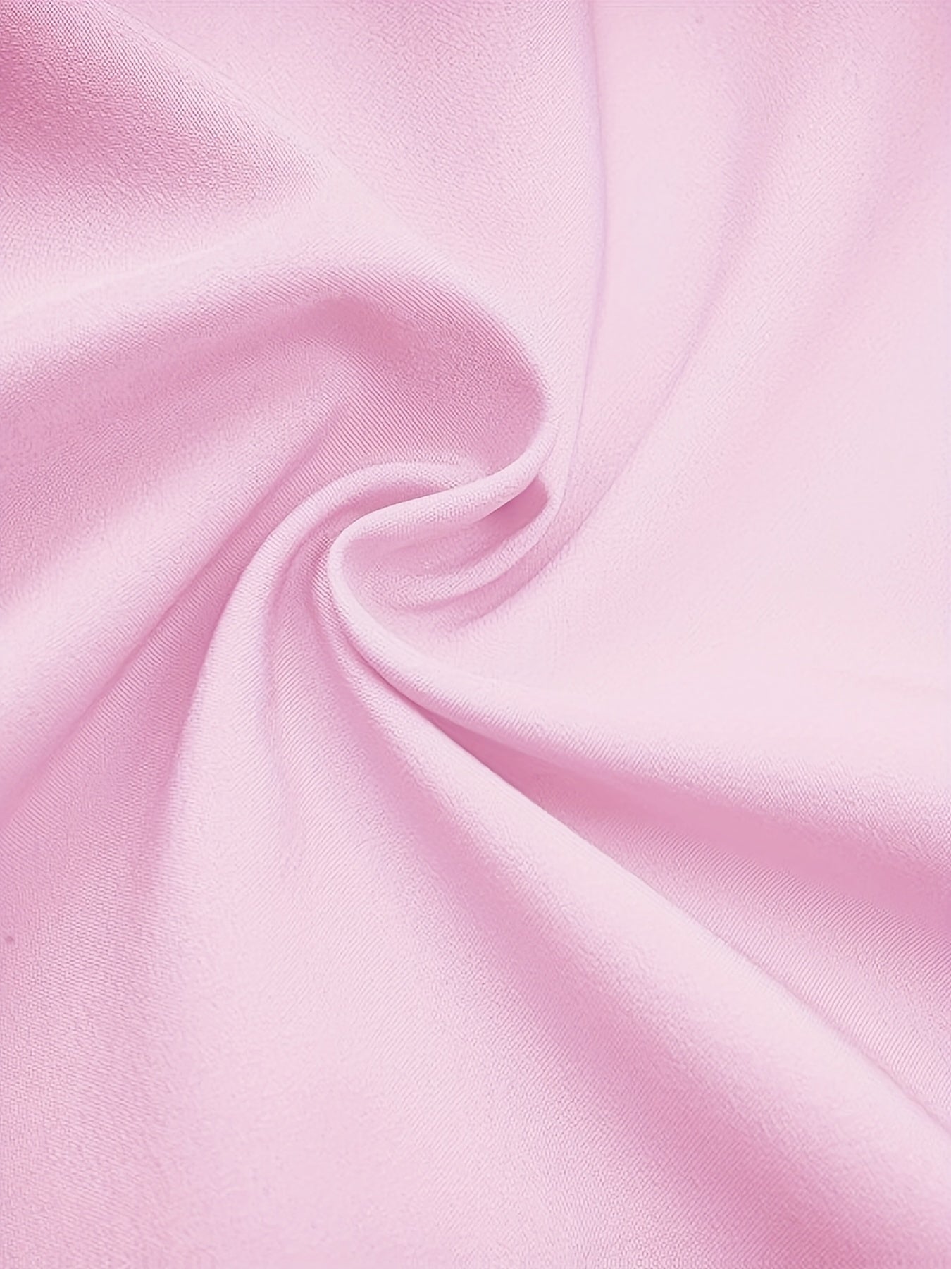 Camisa amarilla de poliéster para mujer con cuello de solapa y dobladillo asimétrico