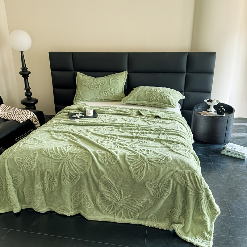 Плед "Бабочка Зеленый" из тафты однотонного жаккарда, идеально подходит для кровати, дивана или кушетки благодаря своему многофункциональному дизайну.