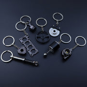 Car Keychains Piston Brake Disc Gear Turbocharger Engine Blade Steering Wheel Accessories