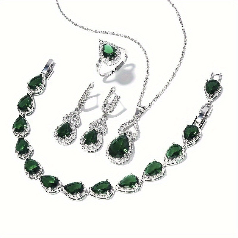 Ayollar uchun zamonaviy 5-qismli sintetik zirkon taqinchoq to'plami - gippoallergen mis marjon, uzuk, bilaguzuk, platin qoplamali pendant zanjiri. To'ylar, banketlar va 14-fevral sovg'asi uchun mukammal. Abadiy dizayn.