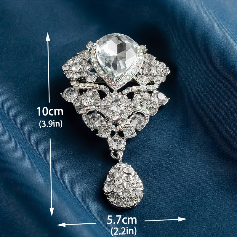 Zargarlik toshlari bilan bezatilgan nozik brosh - har qanday kiyimga zamonaviy va nafis qo'shimcha