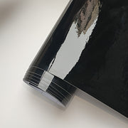 Avtomobillar, noutbuklar, telefonlar, mototsikllar uchun qora yaltiroq vinil avtomobil qoplamasi, 10-50 sm