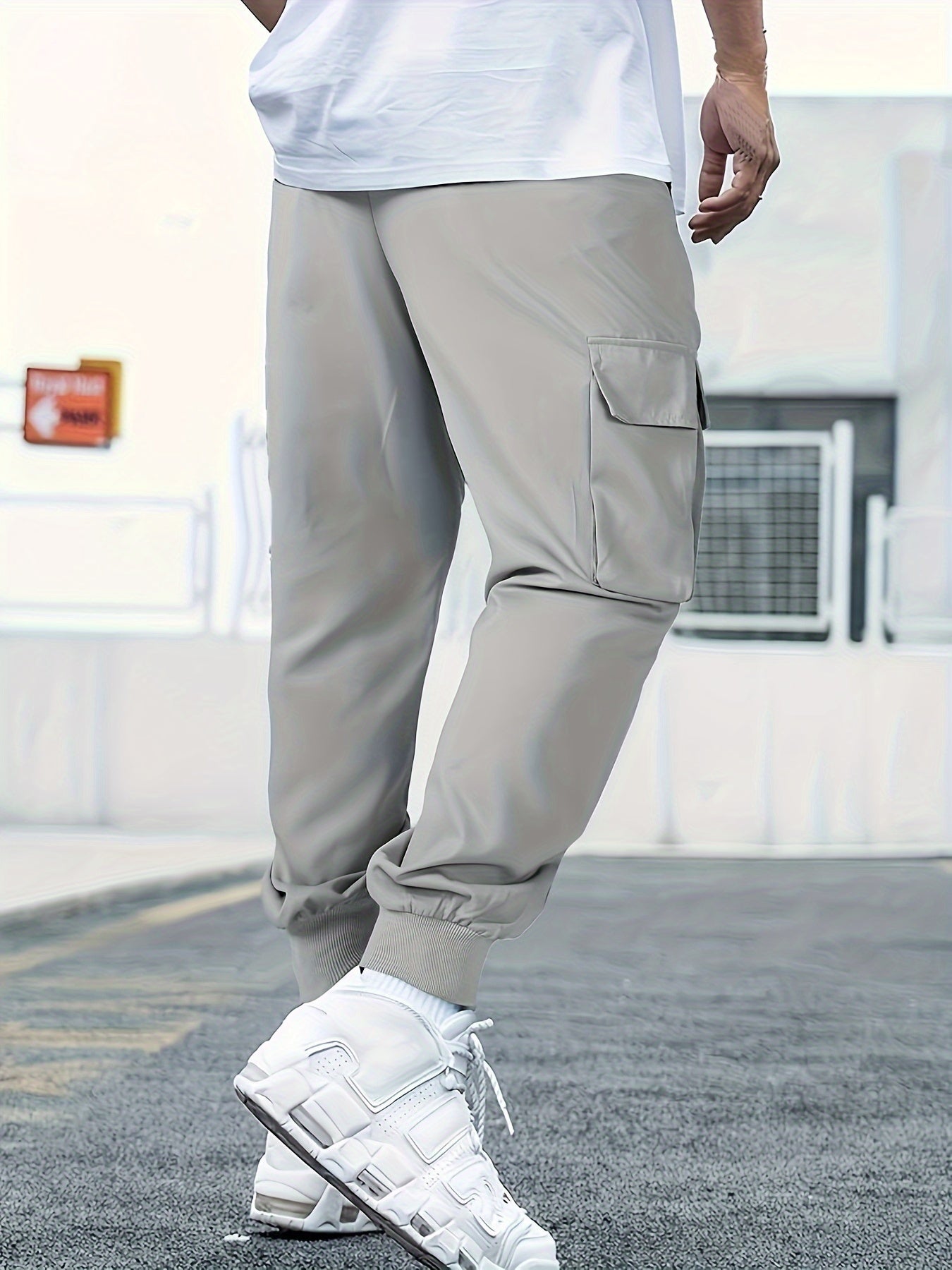 Men's Casual Cargo Pants with Multiple Pockets and Drawstring Tied Feet for Spring 2023