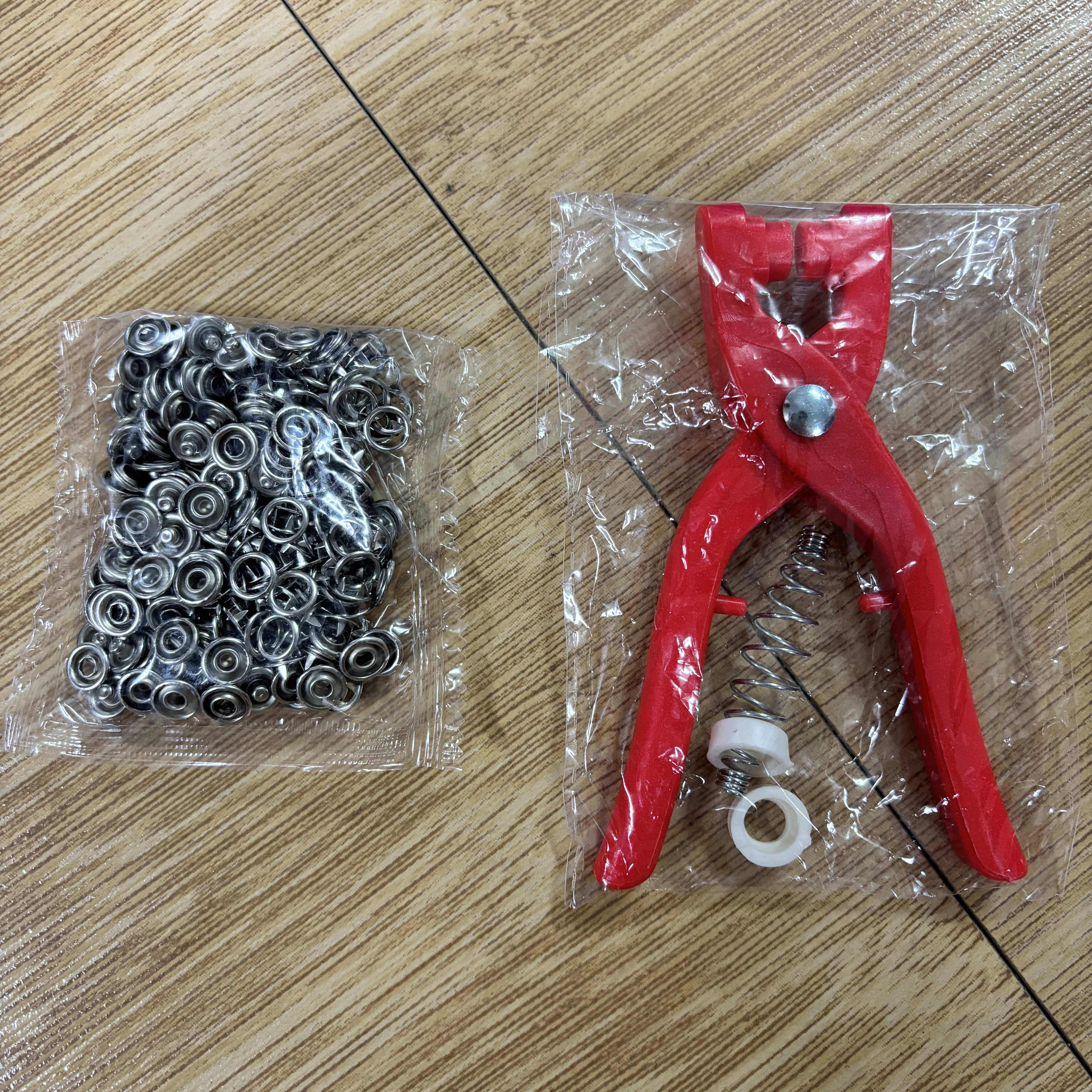 50 Sets of Metal Snap Fasteners Kit with Pliers for Sewing Crafts and Clothing Accessories in Orange and Silver Grey