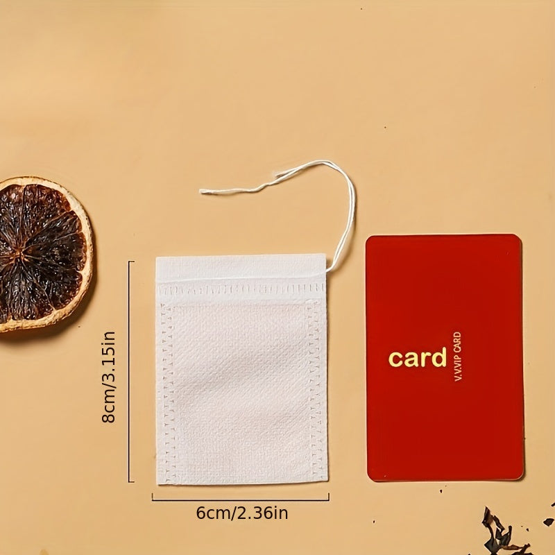 10 yoki 20 dona tortish qopqog'i bilan bir martalik choy filtr sumkalari, choy va ziravorlarni tayyorlash uchun to'qilmagan matodan tayyorlangan