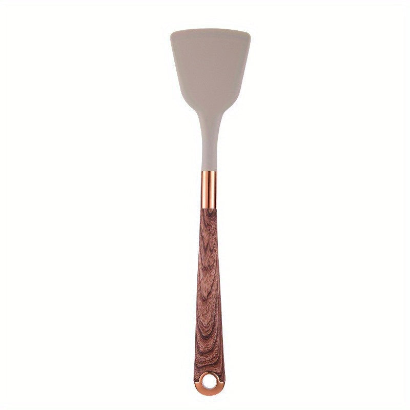 Silicone yog'och to'qimalari spatula, yopishmaydigan qoplama va issiqqa chidamli tutqich bilan, uyda pishirish uchun zarur bo'lgan oshxona asbobi