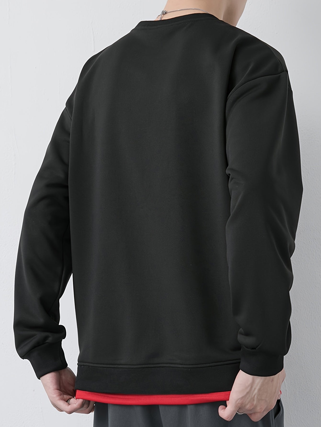 Erkaklar uchun soxta ikki qismli sviter, chiziqli naqsh, appliqué detali va yumshoq bo'yin. 100% polyester to'qima matodan tayyorlangan, biroz cho'ziluvchan va odatdagi kesim. Bahor va kuz uchun ideal.