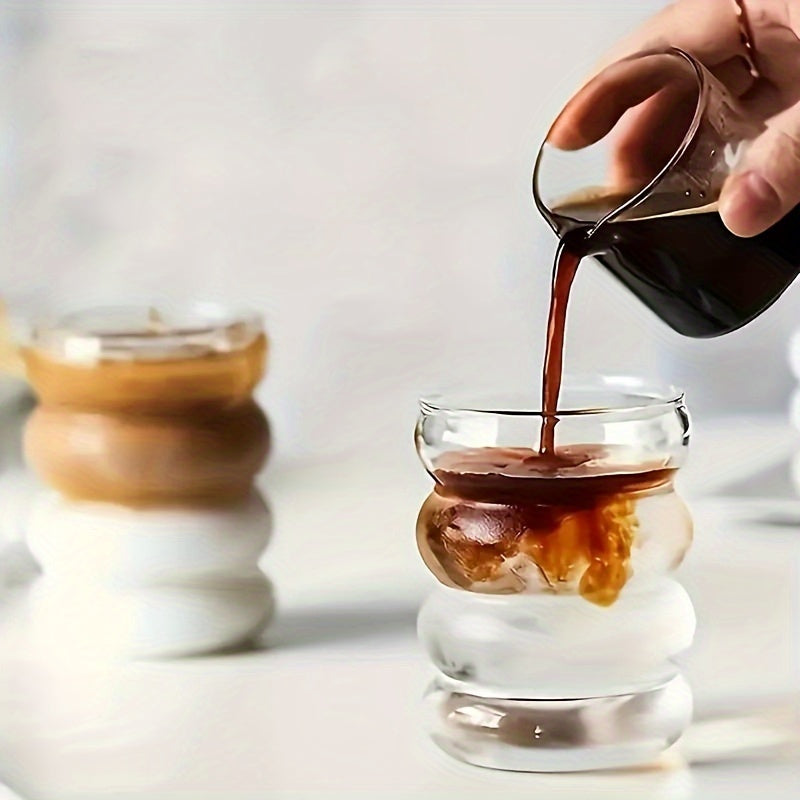 Premium borosilikat shishadan tayyorlangan izolyatsiyalangan Caterpillar kubog'i. Faqat qo'lda yuvish. Issiq va sovuq ichimliklar uchun mos. Ekologik toza va qayta ishlanadigan.