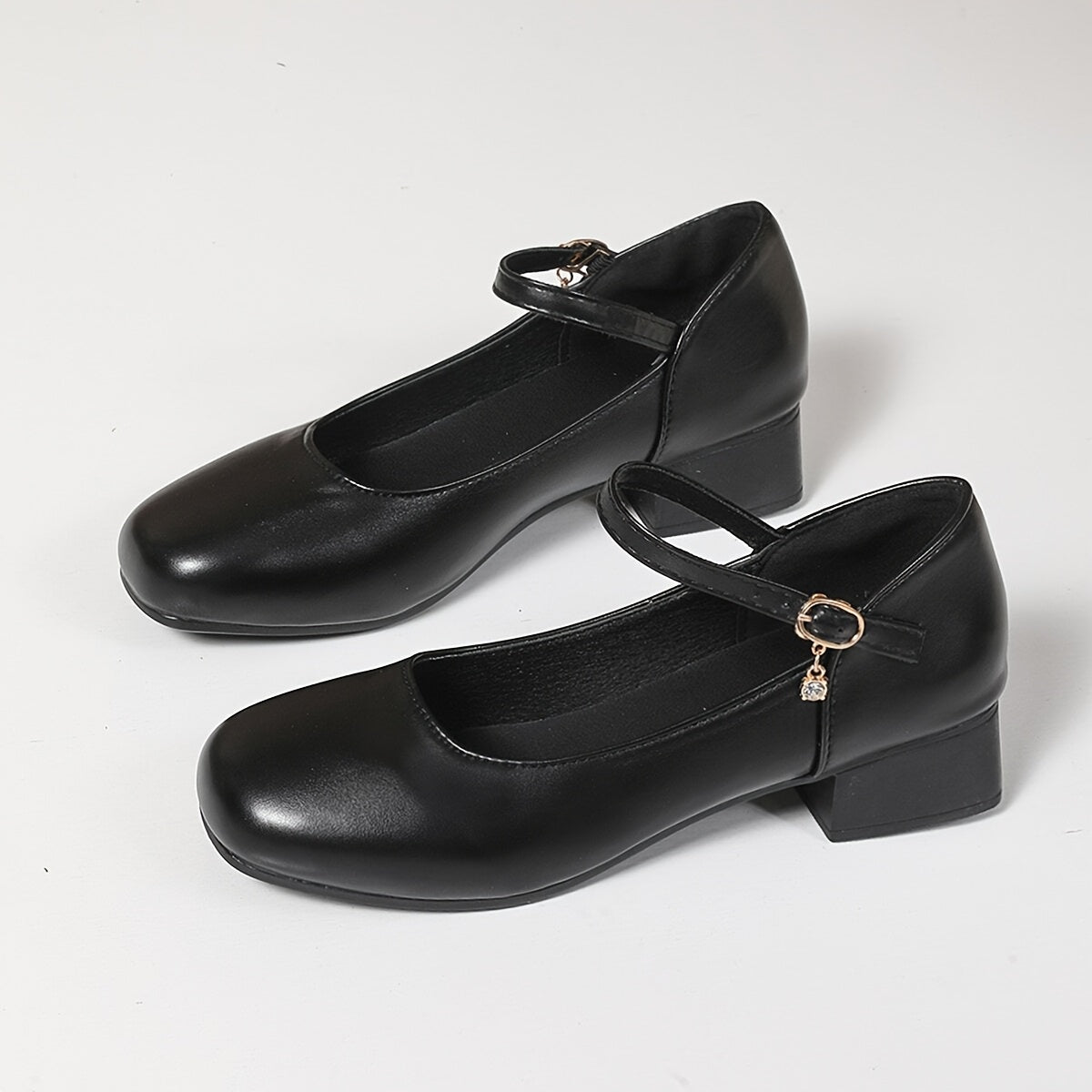 Women’s Black Mid-Heel Pumps with Ankle Strap and Rubber Sole