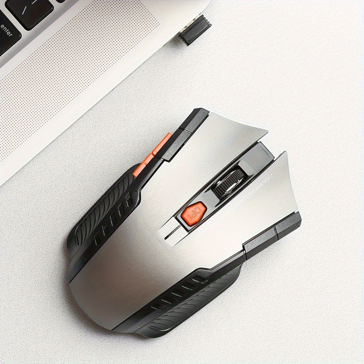 Ergonomik dizaynga ega portativ simsiz sichqoncha, o'yin va ofis ishlari uchun ideal.