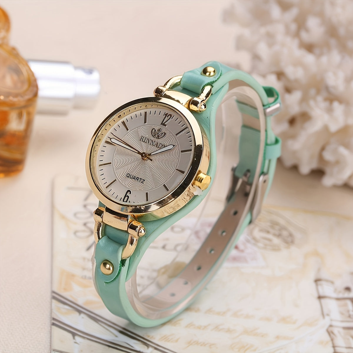 Women's Quartz Watch with Black Faux Leather Strap and Gold Accents Elegant Analog Wristwatch
