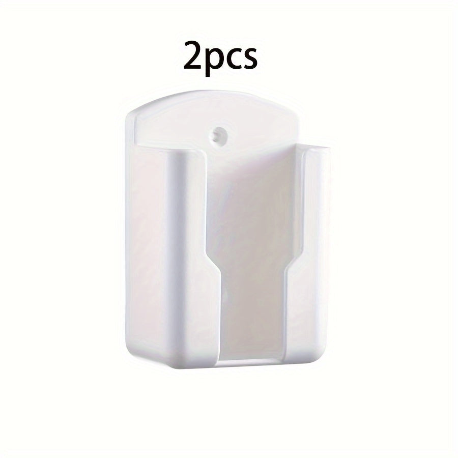 TV, konditsioner va pultlar uchun devorga o'rnatiladigan saqlash tashkilotchisi - 2 ta bo'lakni sig'dira oladi. Telefon zaryadlovchilari va boshqalar uchun teshiksiz yopishtiruvchi tutqich. Saqlash qutilarini tartibga solish uchun ideal.