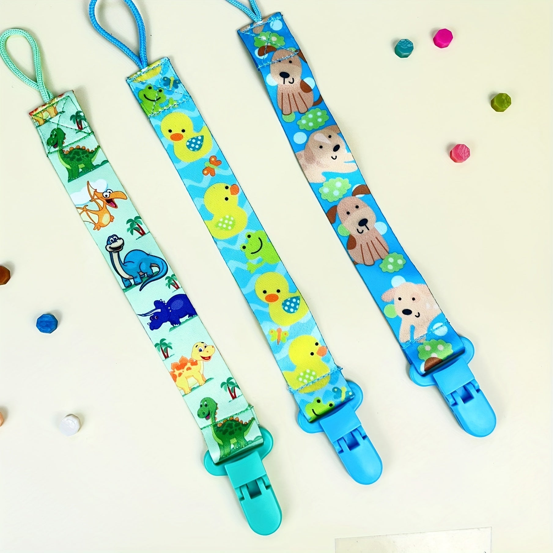 Clip de chupete de plástico de dibujos animados con patrón caprichoso y clip de sujeción
