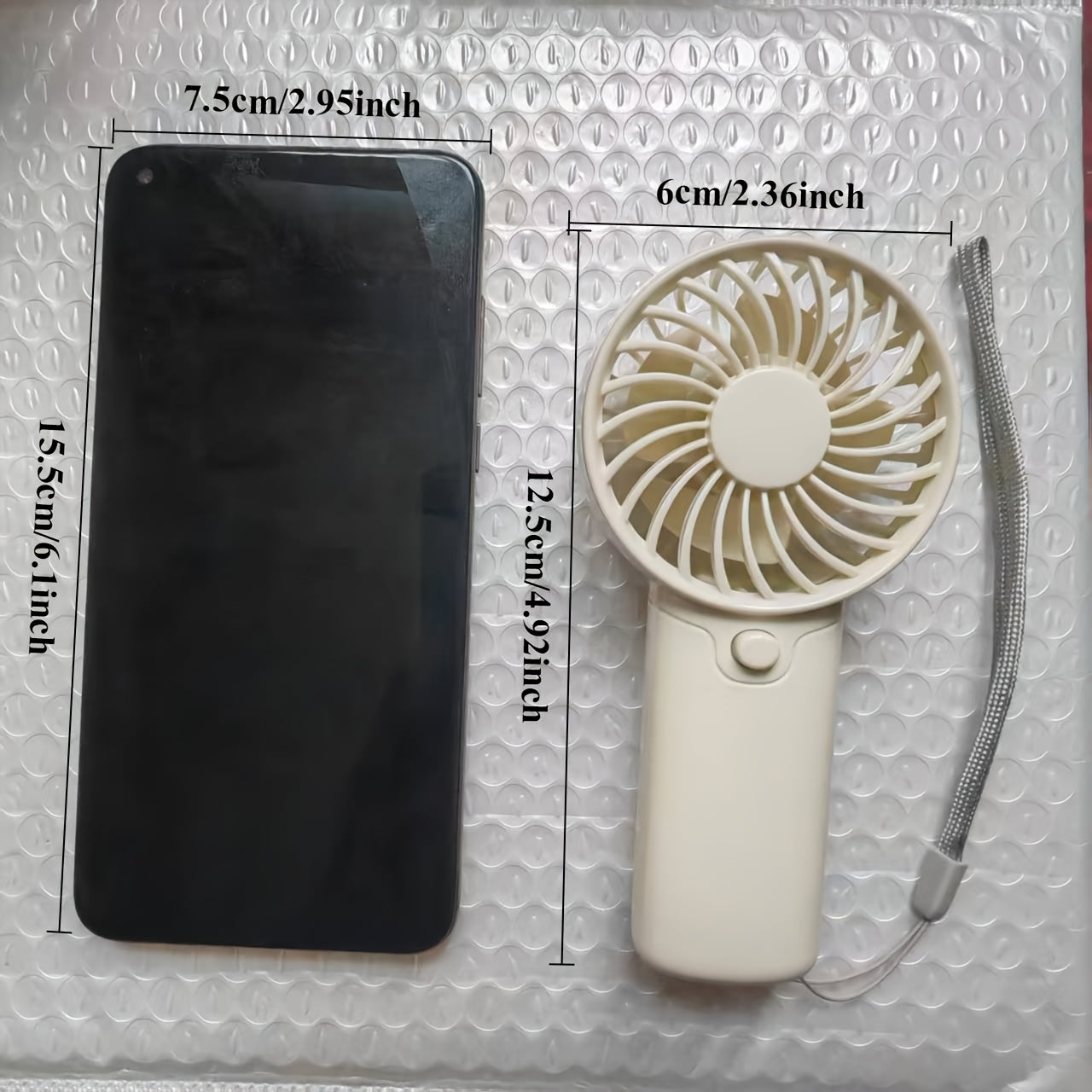 Batareya bilan ta'minlanmagan portativ qo‘l fan, yengil va sozlanadigan, qulay va ijodiy dizayn, cho'ntak o'lchamida va chiroyli.