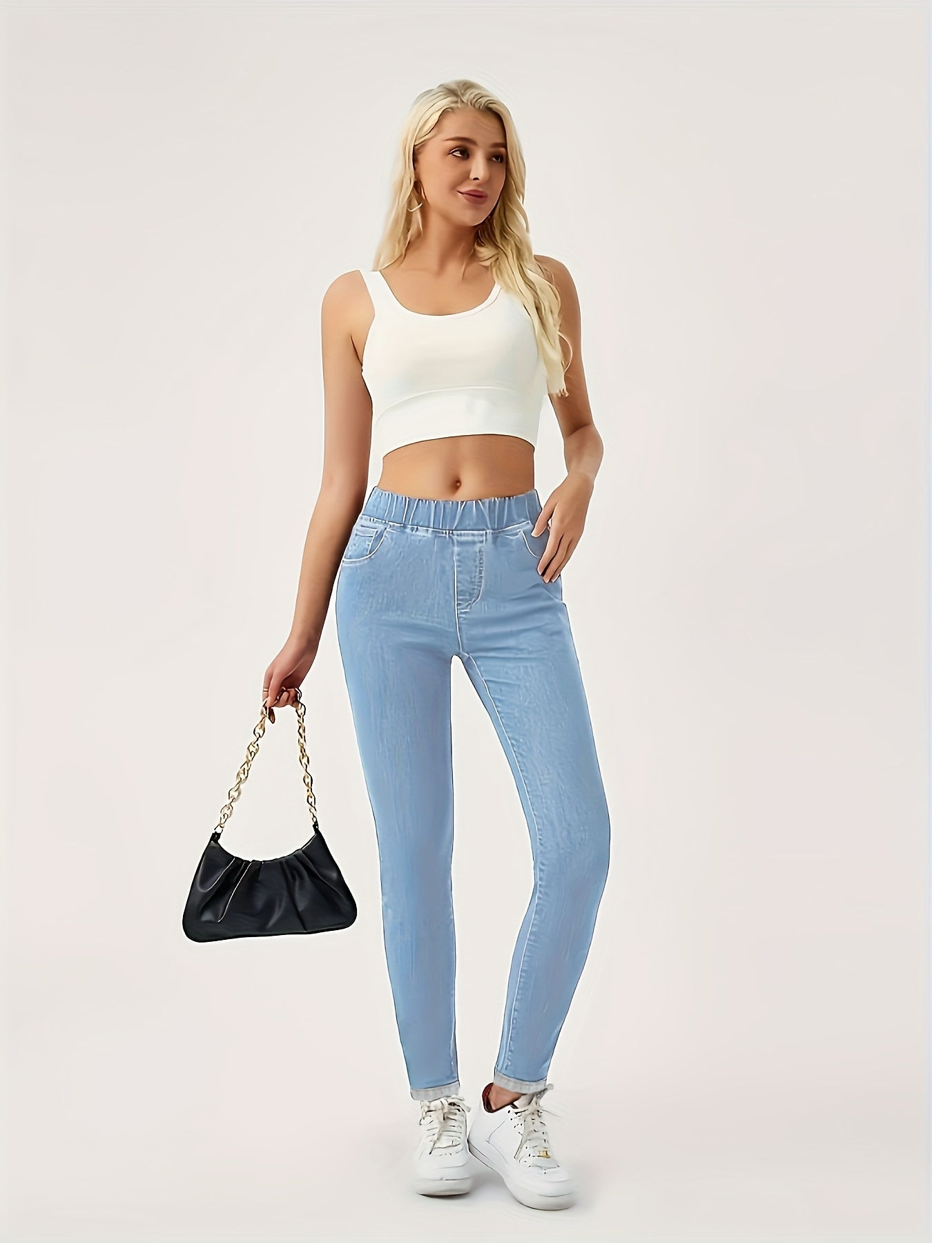 Ayollar uchun keng hajmli elastik denim jinsi, yuqori bel, yengil ko'k, tor fit