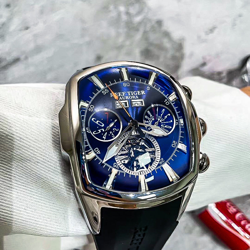 Reef Tiger Lüks Erkaklar Mexanik Tourbillon Soati, ko'k dial, zanglamas po'latdan yasalgan korpus, silikon tasma, kalendar funksiyasi, avtomatik qaytargich, sport dizayni RGA3069, norasmiy foydalanish uchun mos.