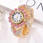 Reloj de pulsera de cuarzo para mujer con caja de aleación de zinc adornada con rhinestones y correa de tono dorado