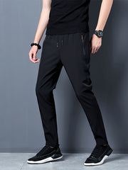 Men's Casual Solid Polyester Pants with Zipper Pockets Drawstring Barrel Trousers for Outdoor Activities