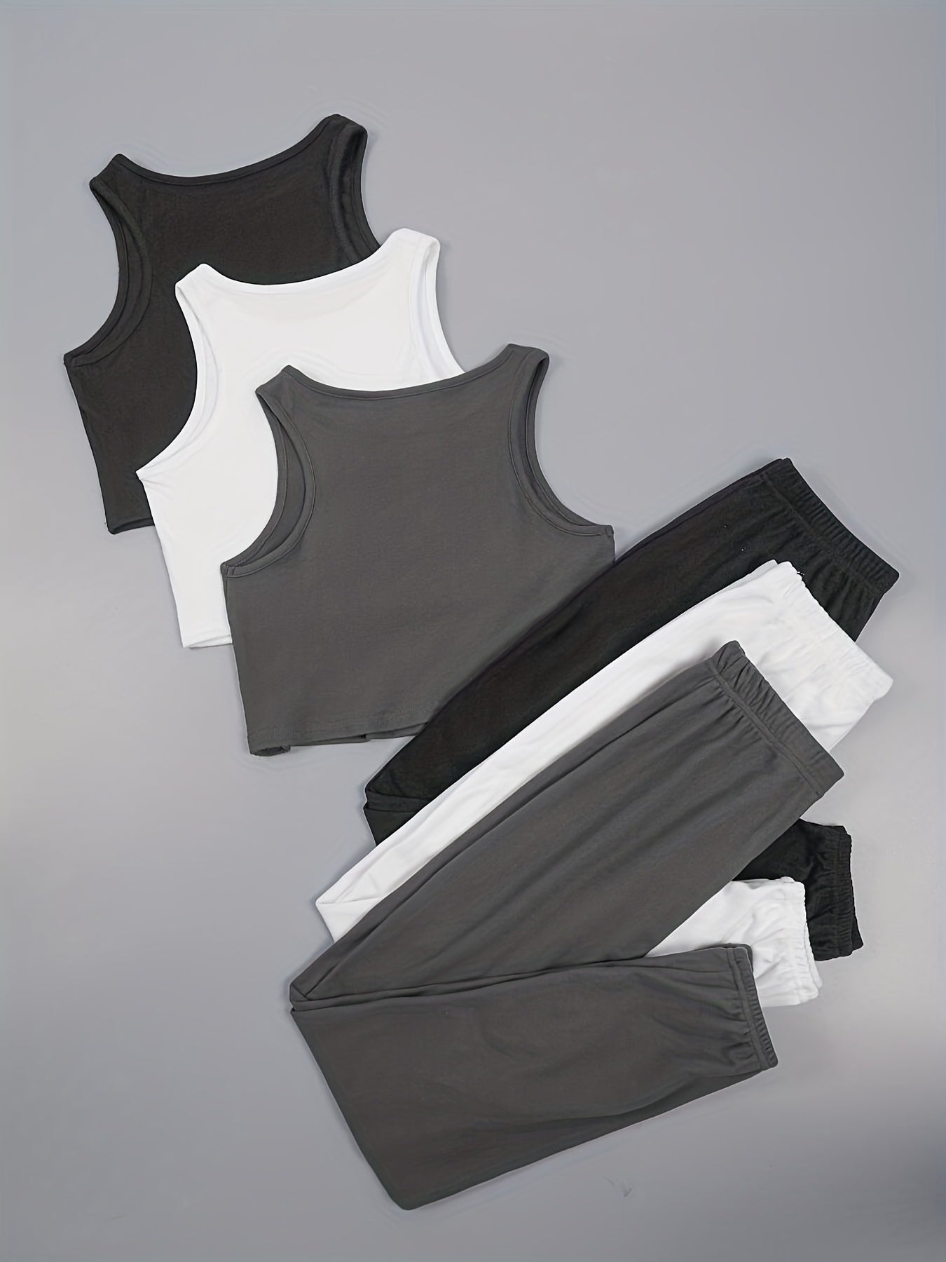 Женский комплект из 3 предметов однотонного цвета: безрукавки и джоггеры черный, белый, серый