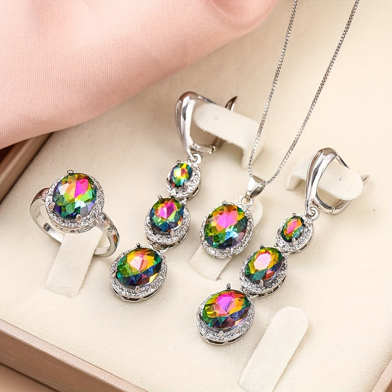 Zargarlik to'plami, to'rt qismdan iborat, rang-barang sun'iy toshlar bilan kumush rangli joylashuvda, marvarid, uzuk, bilaguzuk va cufflinklarni o'z ichiga oladi, ayollar uchun maxsus tadbirlar, masalan, banketlar va yubileylarda mukammal sovg'a.