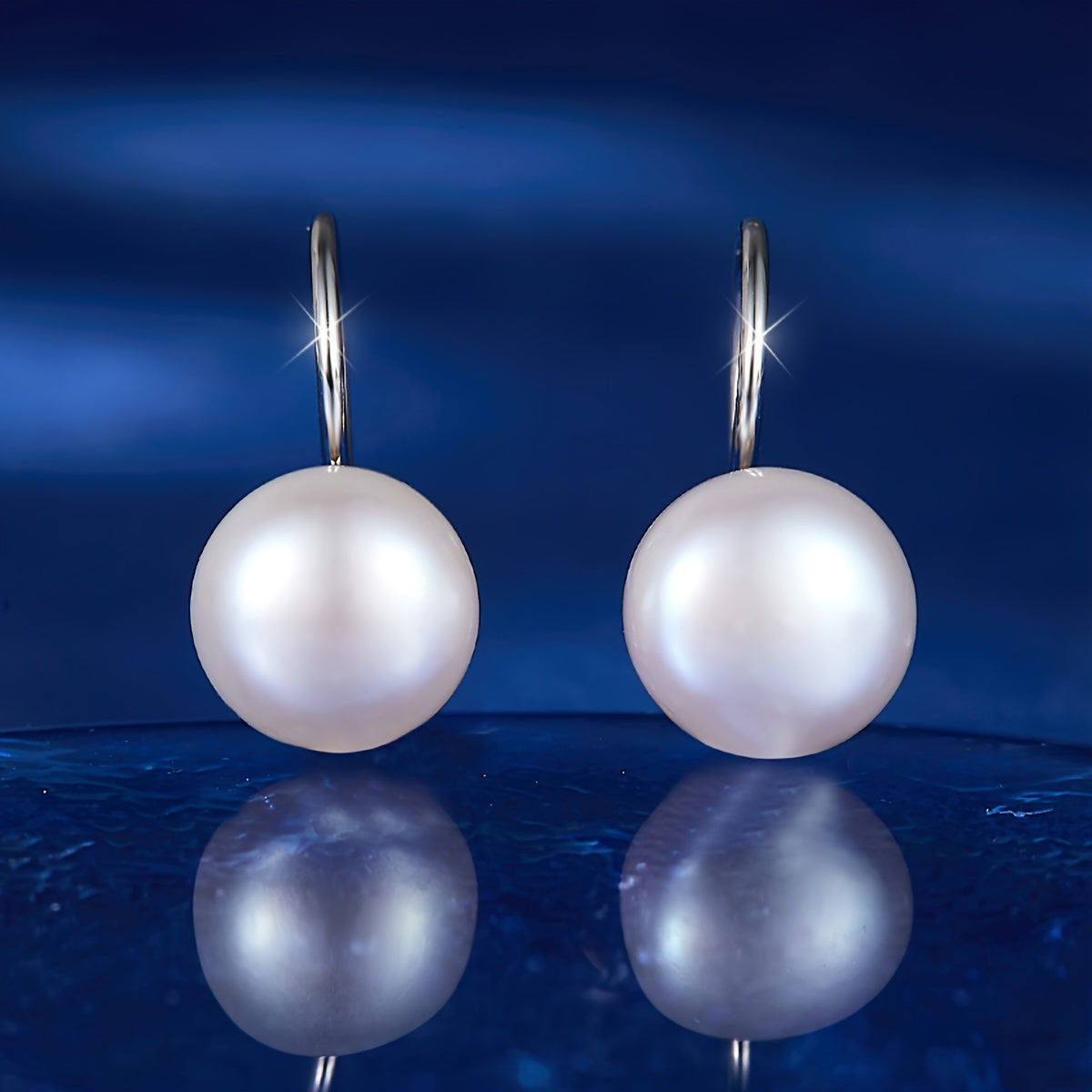 Ushbu S925 sterling kumush marjonlar tabiiy shirin suv marjonlari bilan ayollar uchun nozik va nafis sovg'adir. 2 gramm og'irlikda bo'lib, ular oddiy, lekin retro dizayni bilan har kuni kiyish uchun mukammaldir.